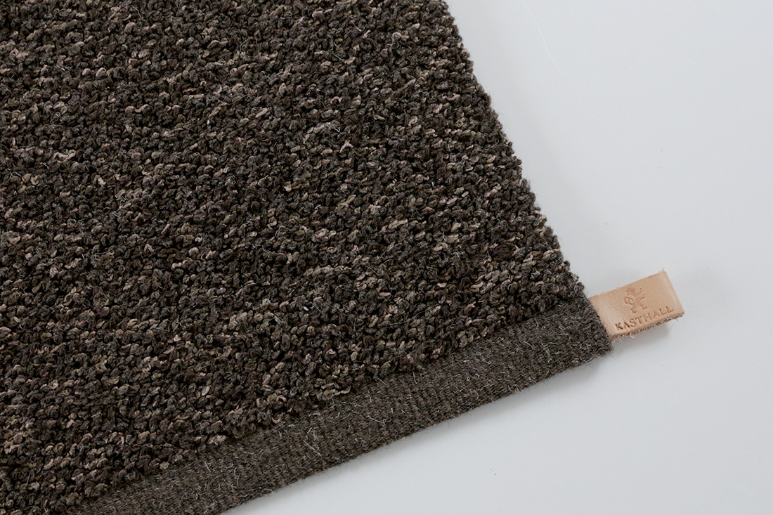 エステル スモーキーブラウン ラグのタグ